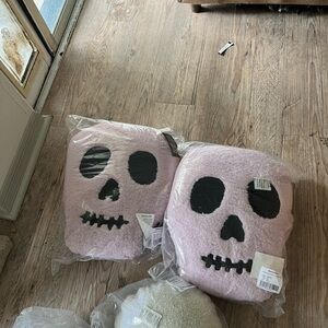 Set two Cynthia Rowley lavender skulls pillows